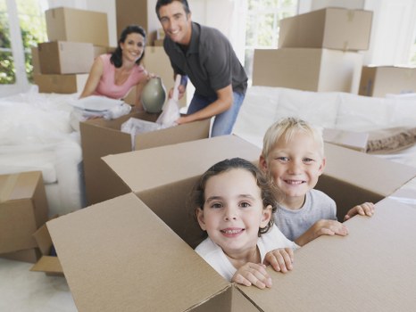 Removal team preparing a home move in Haringey with boxes and furniture
