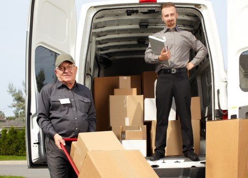 Local flat removals team loading belongings from a Haringey property