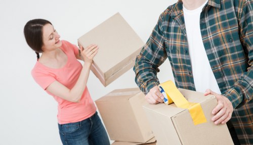 Careful furniture handling during an apartment move in Haringey