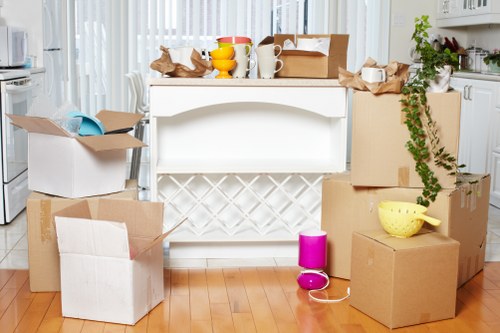 Packed boxes and furniture prepared for a house move in Haringey