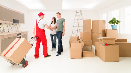 Careful furniture handling during a local house removal in Haringey