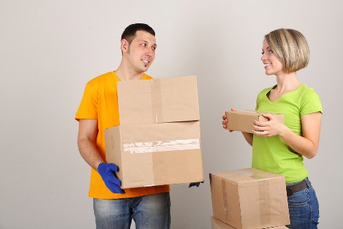 Fragile item packing supplies including bubble wrap and tape for safe transport