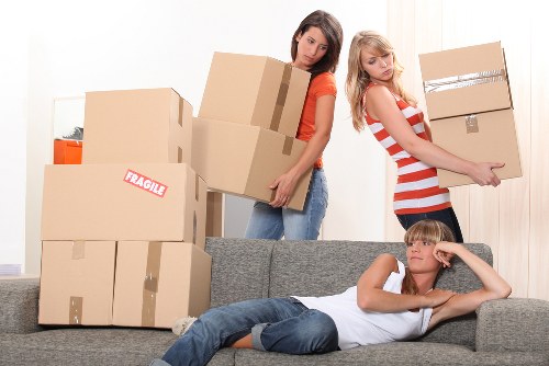 Local movers loading furniture for a residential move in Haringey