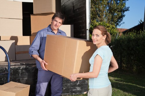 Team handling furniture during a professional removal job