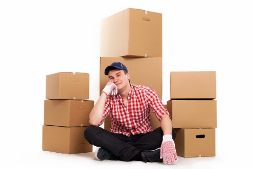 Packed boxes and wrapped furniture prepared for a Haringey flat move
