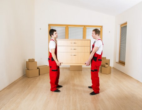Packed boxes and furniture ready for a local same day move