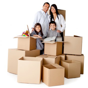Removalists carrying furniture down stairs in a Haringey flat block